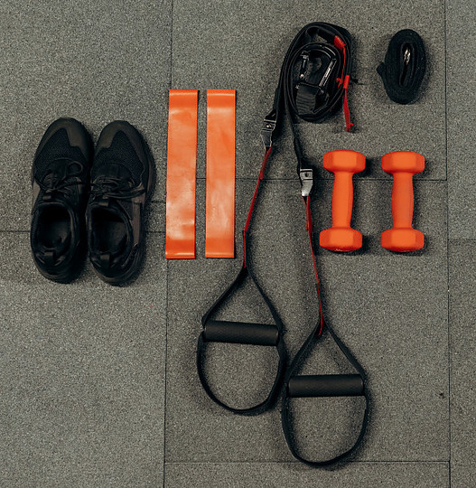 Picture of exercise equipment and a pair of trainers
