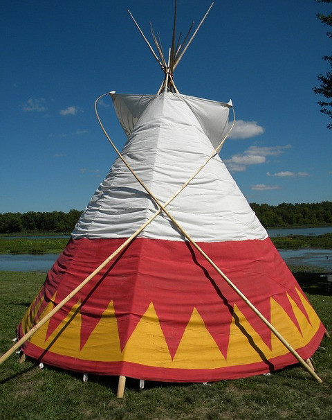 Picture of a pitched TeePee overlooking the lake
