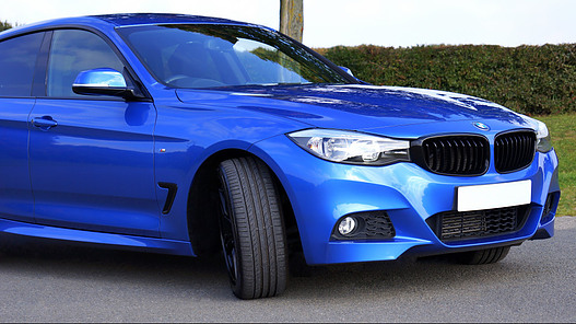 Picture of a highly polished blue BMW