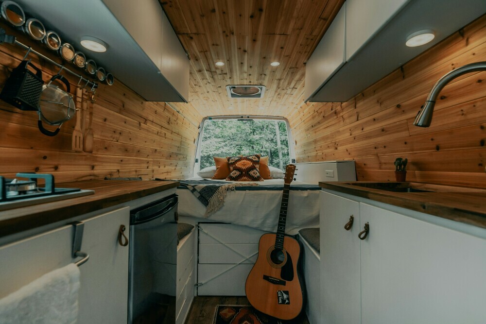 Interior of a van that has been converted into a camper